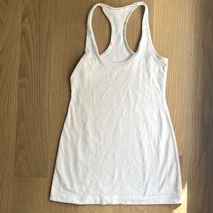Lululemon white tank with rainbow 🌈 trim inside; great used condition! Size 4